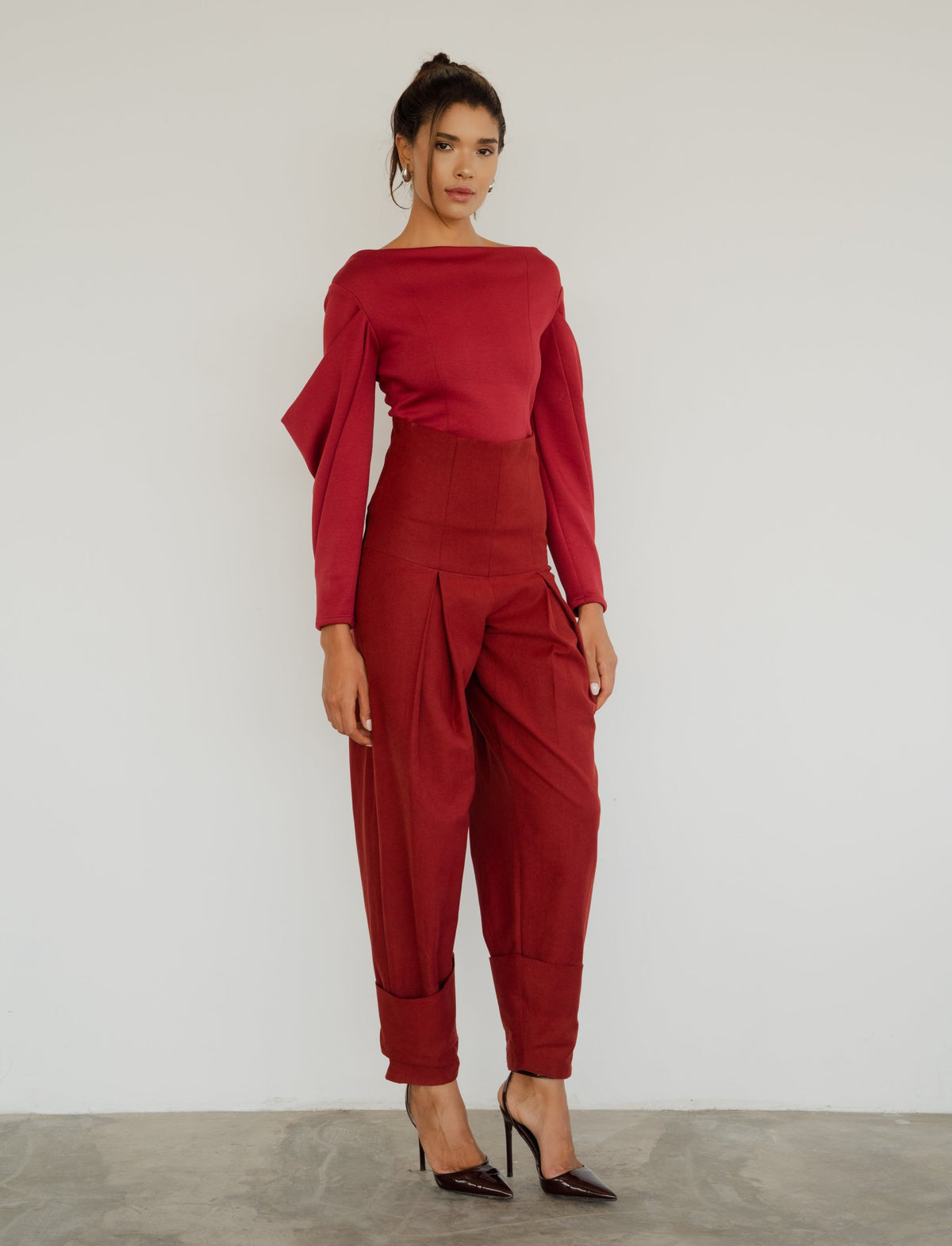 Model wearing the Andre Top in burgundy with the Nora Pants, front view [Burgundy]