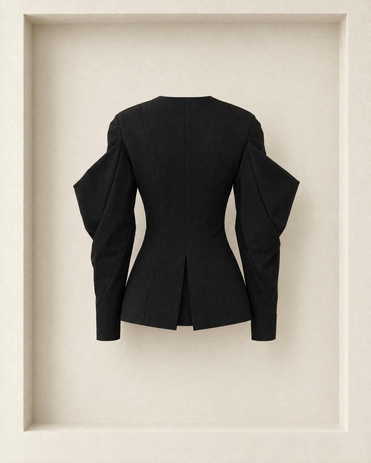 Ansra Jacket in black, back view — princess seams, sculpted sleeves and inverted back pleat