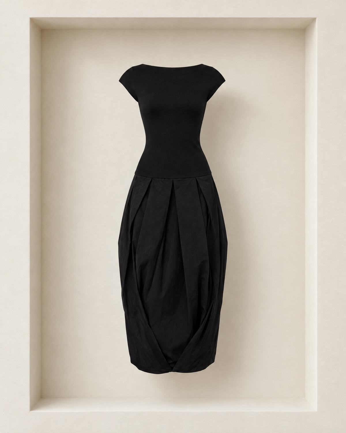 Lyon Dress in black, front view — cap sleeves, fitted bodice and pleated balloon skirt