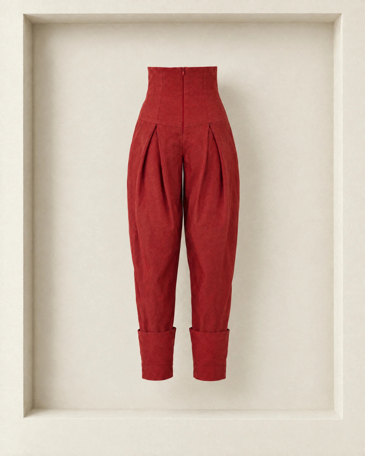 Nora Pants in burgundy, back view — centre-back zip through the yoke and fold-up hems [Burgundy]