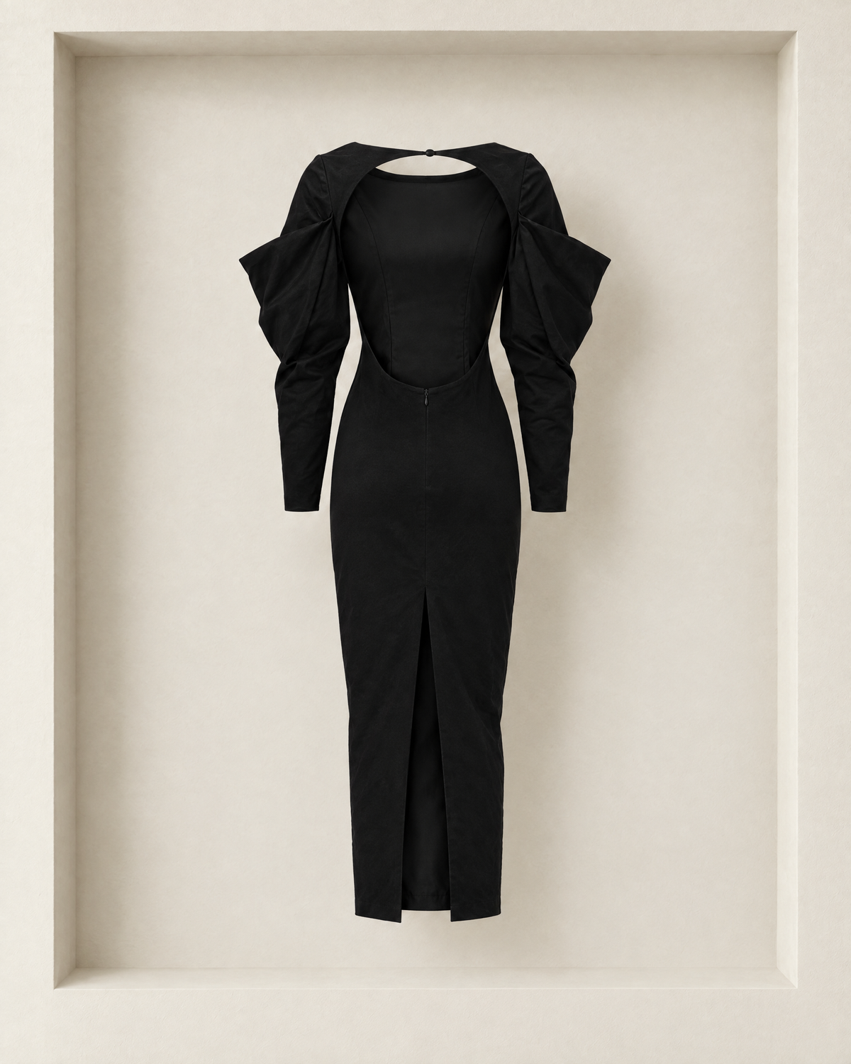 Seraphine Dress in black, back view — deep oval open back with a single button at the nape and centre-back slit